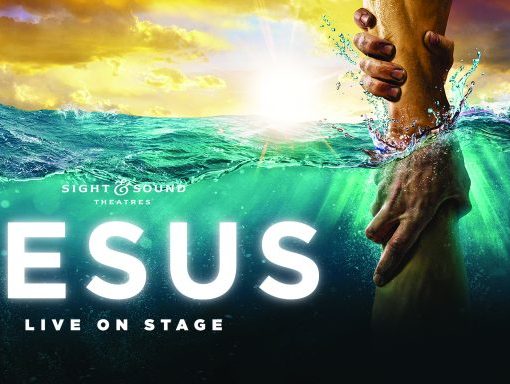 Spectacular 'Jesus' live show poster with ocean scene and hand reaching through water at Sight & Sound Theatres.