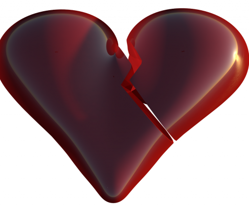 Shiny red broken heart with a crack in the center, symbolizing heartbreak or emotional pain.